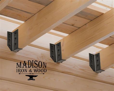 the metal brackets used to support joists are called|joist hanger connectors.